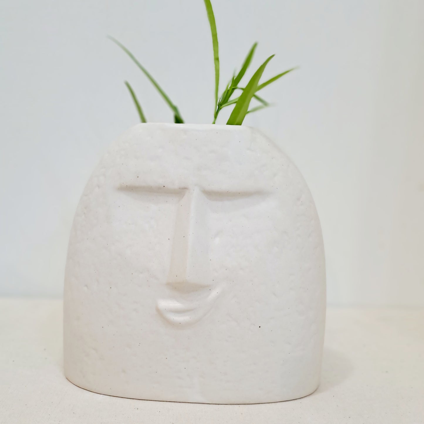 CERAMIC FACE VASE