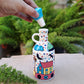 CERAMIC ART HAND PAINTED HUT DESIGN OIL DISPENSER